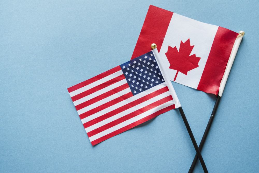 American and Canadian flags